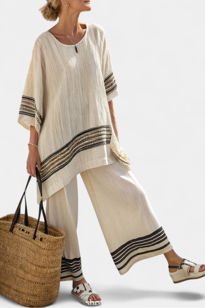 Mariella — Top elegante de lino con rayas negras y pantalones fluidos