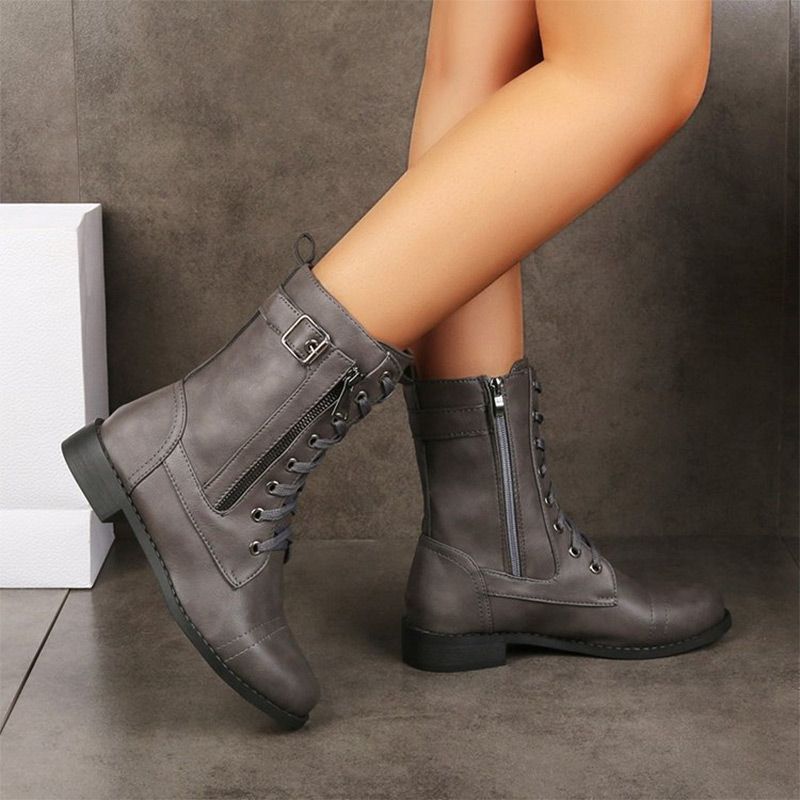 Botas de cuero con punta redonda y cremallera